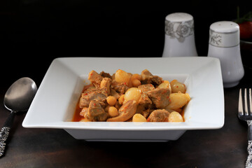 Turkish style meat roast with small shallots and chickpeas. Turkish stew