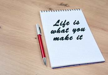 Life is what you make it words on a notebook