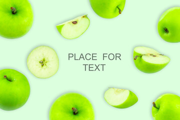 Creative layout with green apples on a light background. Food concept. Copy spaсe
