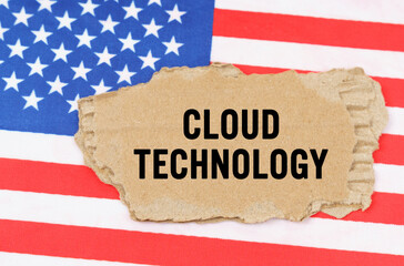 On the US flag lies a cardboard box with the inscription- CLOUD TECHNOLOGY