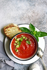 Gazpacho - traditional spanish cold tomato soup. Top view with copy space.