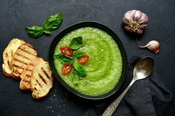 Cucumber gazpacho - traditional spanish cold soup. Top view with copy space.