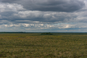 View to the field from the observation tower before the rain