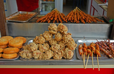 China, Nanjing, attractive chicken foods at the Fuzimiao market. - 429882214