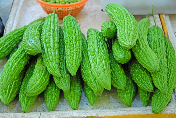 China, Nanjing Chinese bitter melon at Fuzimiao market. - 429882606