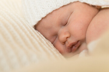 face of newborn baby sleeping