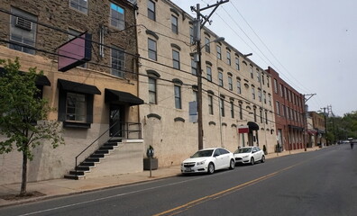 Naklejka premium Streetscape Older City Business District Mixed Use Office Wharehouses Spring Day