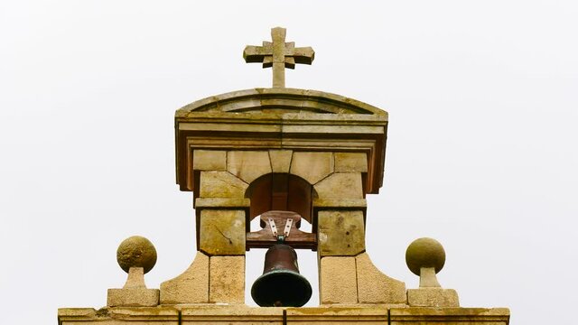 Old small church with bell tower in north Spain. Iglesia de San Martin de Podes in Asturias.