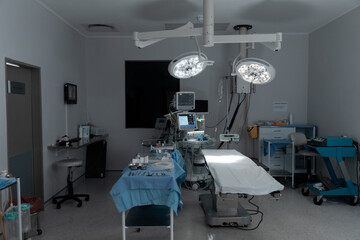 Surgical instruments, operating table, lights and equipment in modern hospital operating theatre