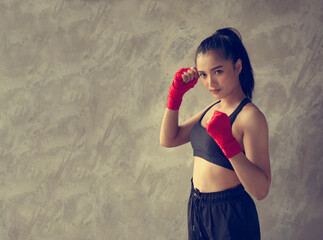 The girl sets up her, ready to fight anything that comes..Set boxing posture