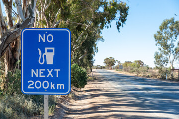 No fuel next 200 km Australian warning road sign in rural area