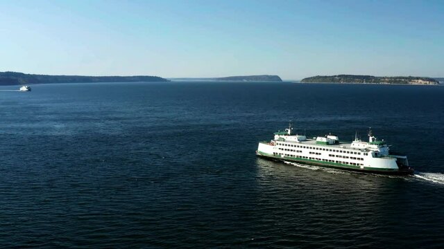 Two Transport Ferries Approaching About to Pass One Another