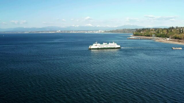 Ferry Crossing Mountains Background Under Blue Skies