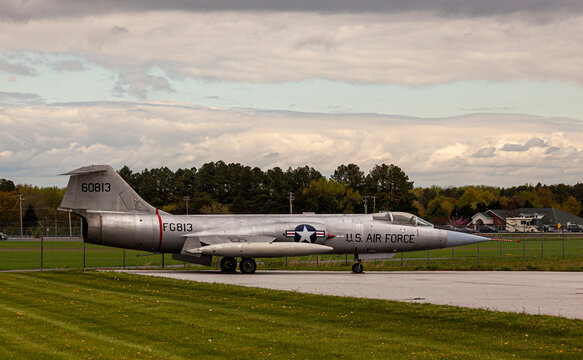 Easton, MD, USA 04-16-2021: One of the last survivors of the famous cold war era interceptor fighter jet Lockheed Starfighter F104A on display on Easton Airport of Maryland.
