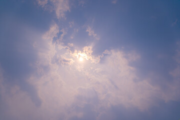 Naklejka na ściany i meble The clouds covered the sun,The sun shines through the clouds,Clouds forming before rain