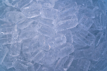Ice cubes close up background.