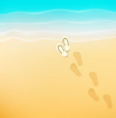Footprints on a sand. Beautiful beach with blue sea