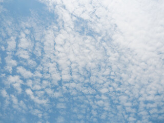 Altocumulus cloud on beautiful blue sky , Fluffy clouds formations at tropical zone	