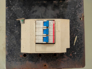 Close-up Micro Switch Breaker. Electrical background. Automatic voltage switchboard with circuit breakers.