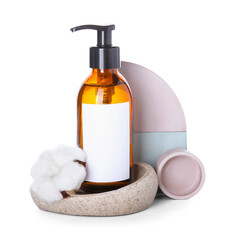 Composition with bottle of natural shampoo and cotton flower on white background