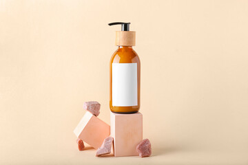 Composition with bottle of natural shampoo on color background