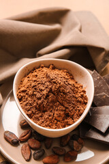 Bowl with cocoa powder, closeup