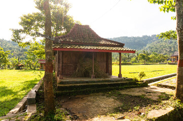 Kuningan, Indonesia - March 26, 2021 - The freshly harvested rice is stored in front of the traditional Sundanese house