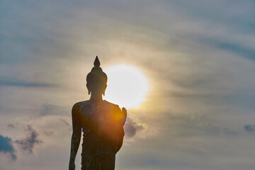 buddha statue in the sunset