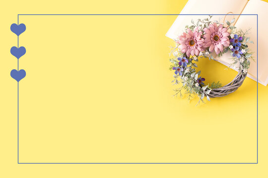 くすみピンクのガーベラと青い花のリースのハートフレーム 黄色の背景 Stock Photo Adobe Stock