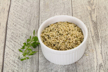Peeled hemp seeds in the bowl