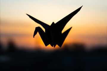 silhouette of a crane at sunset