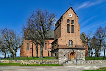 Photographs of the belfry of the Catholic Church of Saint Achatius in Czernice Borowe in Masovia, Poland.