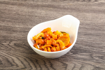 Marinated pickled honey mushrooms in the bowl