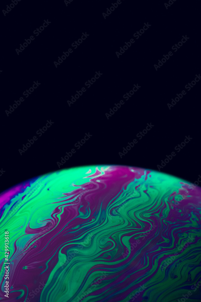 Wall mural bubble macro. abstract galaxy background with globe planet earth in universe space with sunlight on 