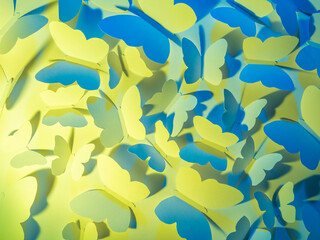 Fototapeta premium Butterflies of bright gradient shades. Concept minimal background.