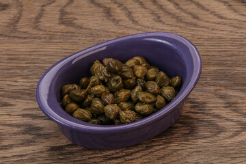 Tasty capers in the bowl