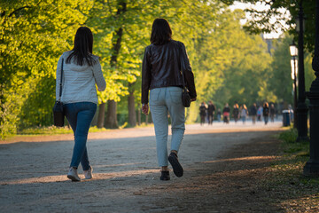 Teenagers Walking in a Public City Park