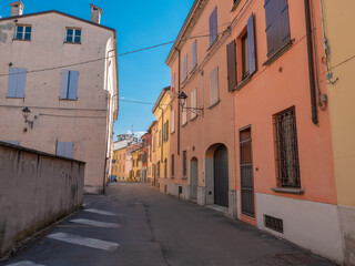 Ancient Colorful Building Facade in a Narrow Street in Italy