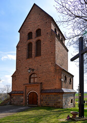 Photographs of the belfry of the Catholic Church of Saint Achatius in Czernice Borowe in Masovia, Poland.