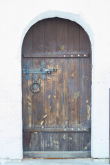 old wooden door in a stone wall