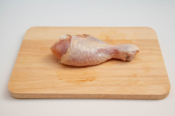 A single leg of fresh chicken