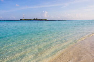 Azure water in the lagoon of the tropical island in the Maldives