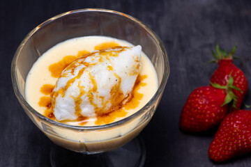 Snowy eggs and custard recipe on black background