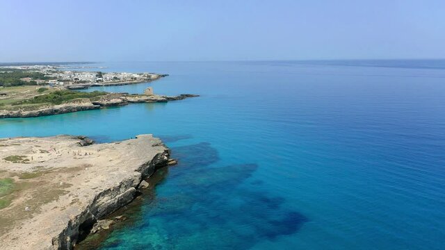 Aerial view, flight at Tower and bay of Roca Vecchia (Torre di Maradico), archaeological sites, Brindisi region, Apulia Italy