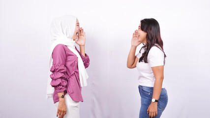 two Asian women screaming expressions isolated white background