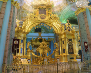The Royal Doors in the altar of the Peter and Paul Cathedral in St. Petersburg (Russia). Rich finishes in gilded bronze, rock crystal and Venetian glass. Rays of light fall from above through the dome