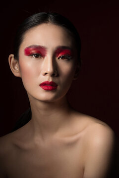 Red eye shadow colour makeup beauty portrait
