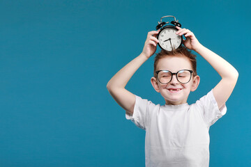 Time management. Morning. little boy with alarm clock. Happy childhood. happy child with retro clock. Define your own rhythm of life. Happy hours concept. Schedule and timing