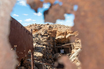 Fototapeta premium Old rusty mining machinery obsolete industrial equipment at abandoned silver mine near Broken Hill, Australia