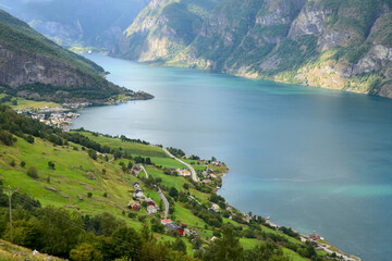 Fototapeta na wymiar Aerial view of Aurlandsfjord and Aurlandsvangen village. Norway.